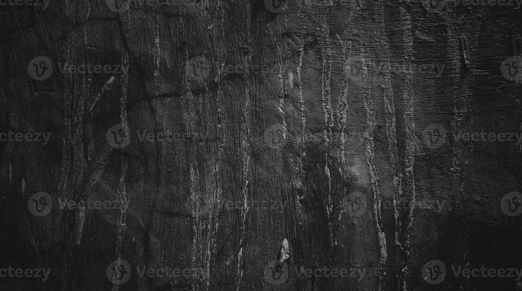Black wall background of natural paintbrush stroke textured cement or stone old. concrete texture as a concept of horror and Halloween photo