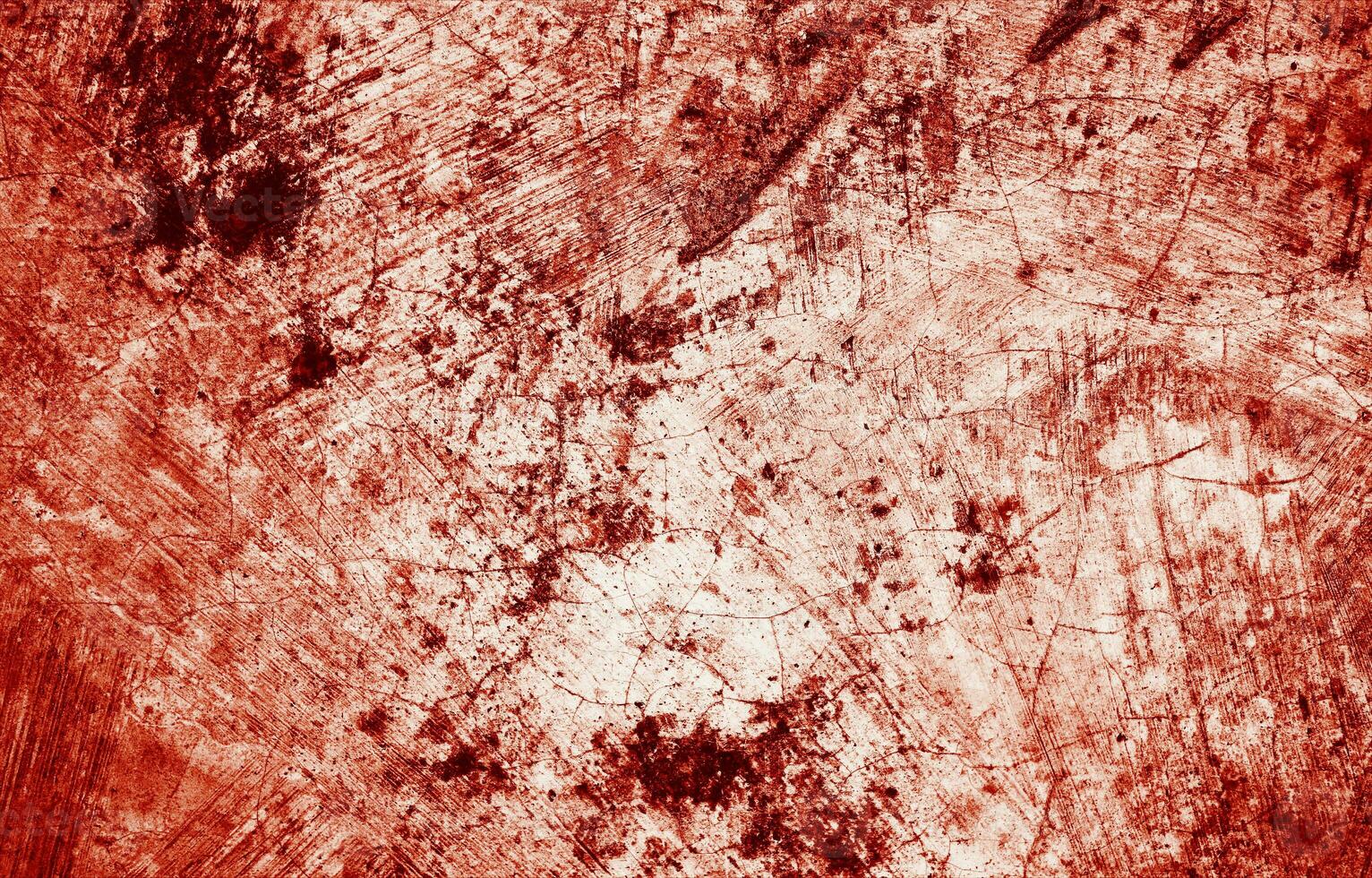 Splatters of red paint resemble fresh blood, their jagged edges contributing to a sense of unease. The stains, reminiscent of Halloween horrors. photo