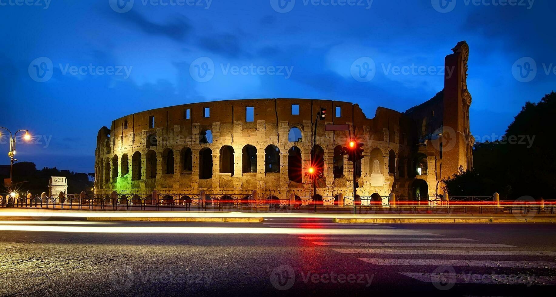 Colosseum at the sunset photo
