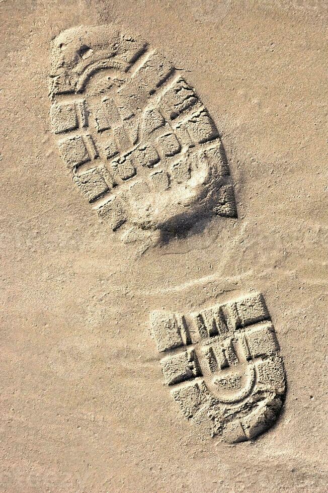 Shoeprint on Sand photo