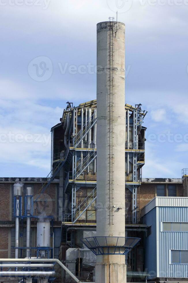 Industrial building with Smokestack photo