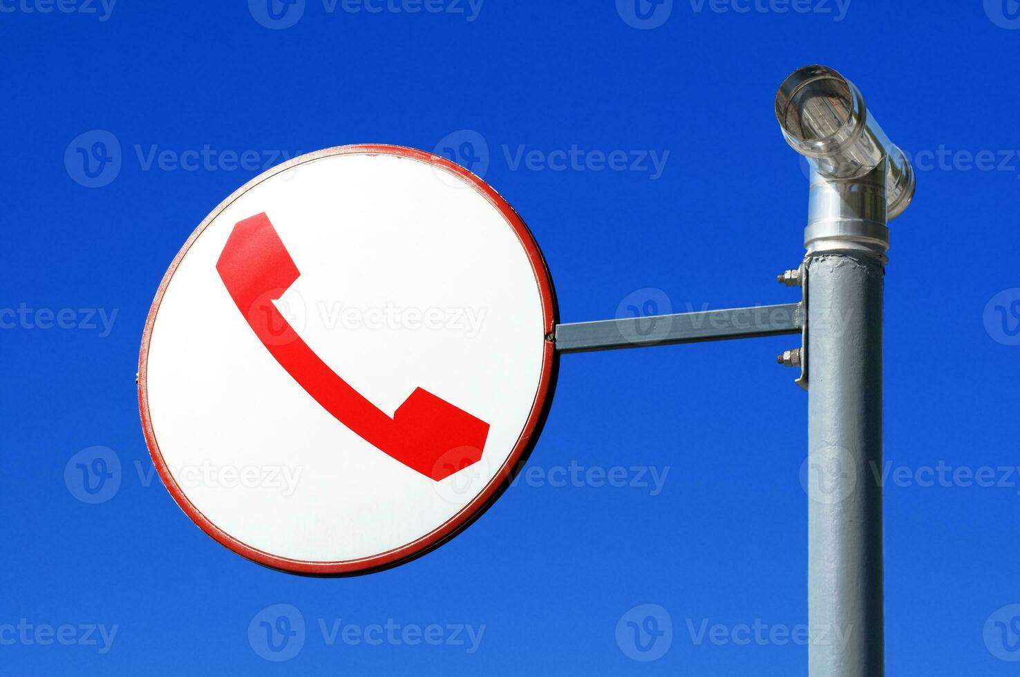 Telephone Sign on Pole photo