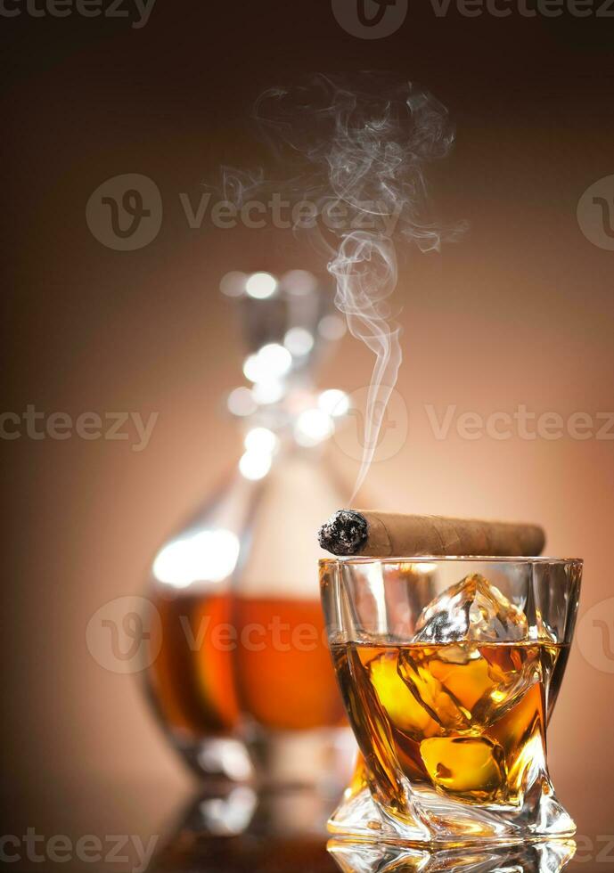 Cigar on glass photo