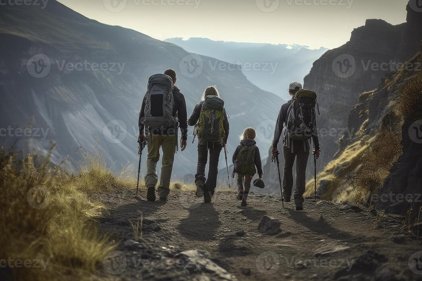 Family hiking in mountain photo