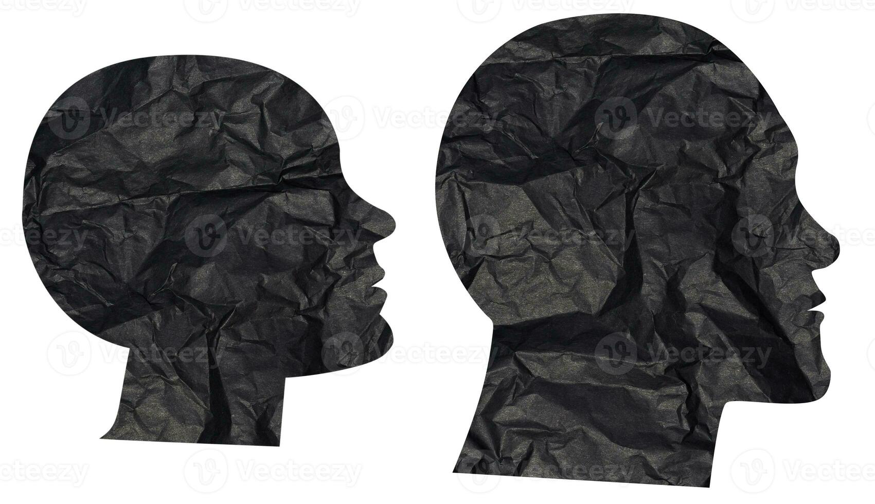 siluetas de cabezas cortar fuera de negro estropeado papel en un blanco fondo, elementos para diseño foto