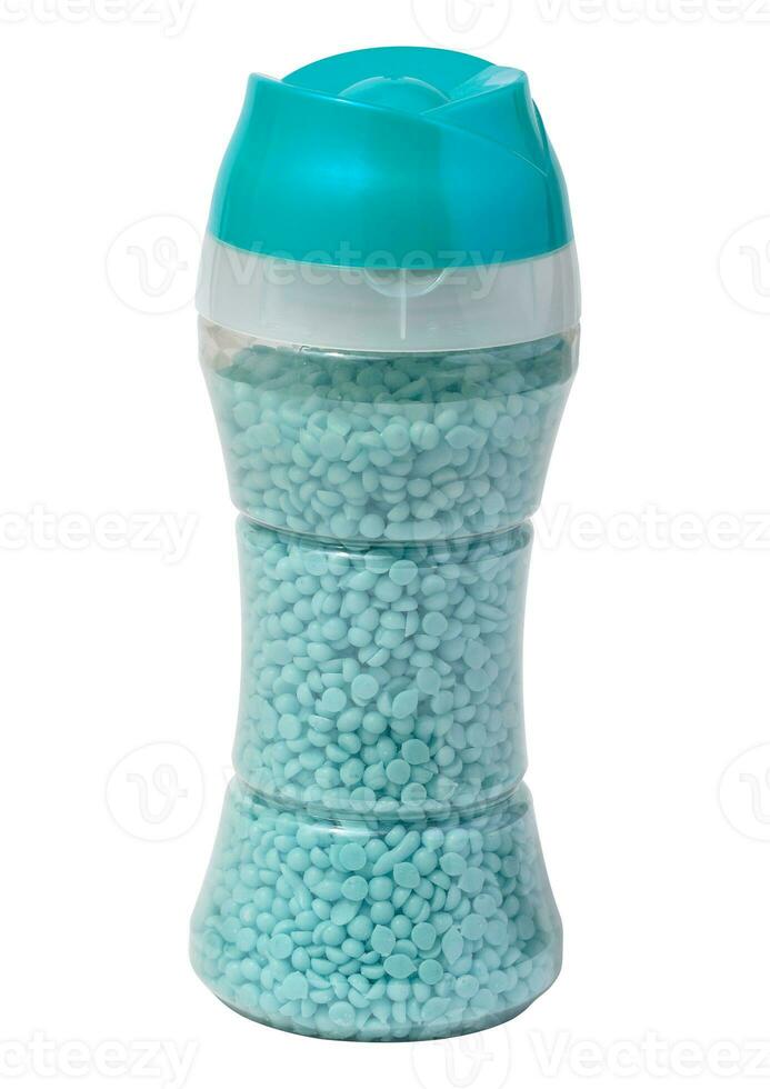 Plastic transparent bottle with aromatic granules for rinsing washing. Laundry softener photo