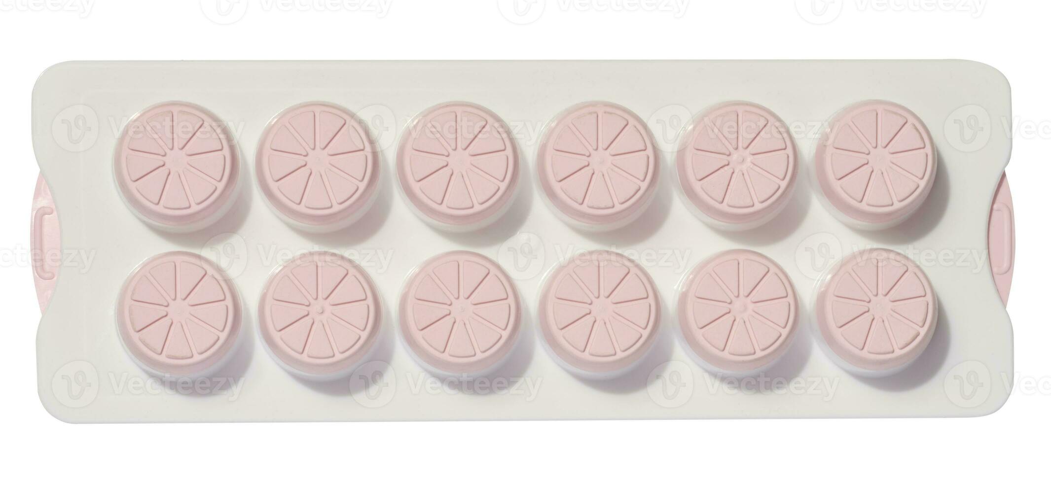 White plastic container for freezing ice or making round-shaped candies, top view photo