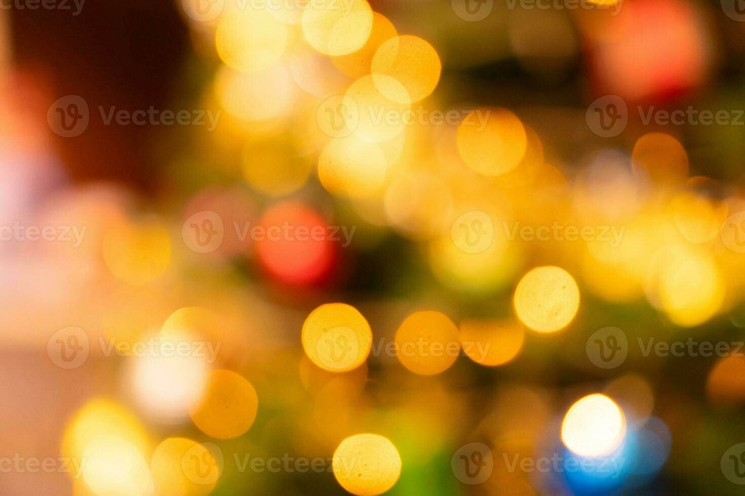 Bokeh of light on Christmas tree with decoration background. photo