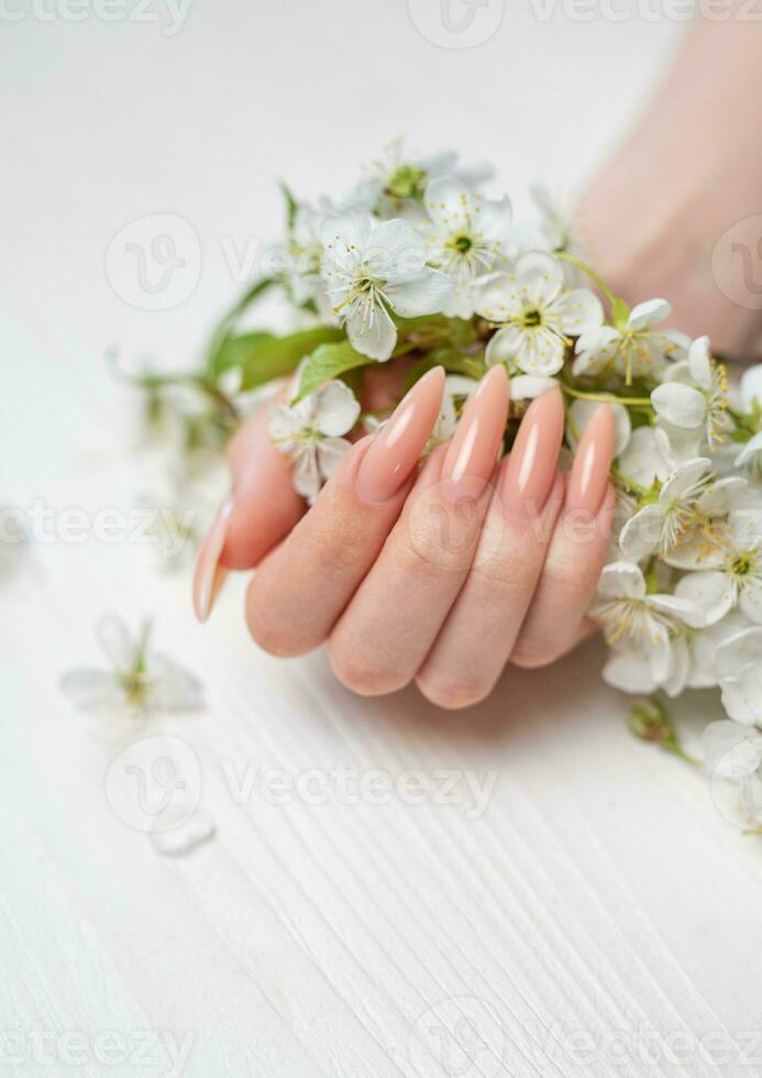 Elegant pastel pink natural manicure. photo