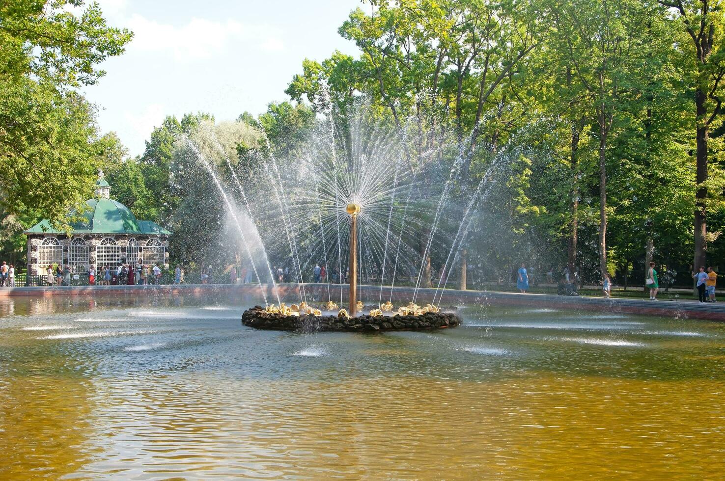 St. Petersburg, Russia - August 20 ,2022 Fountain Sun in Peterhof photo