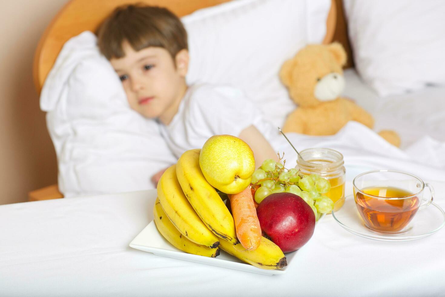 Fruits,hot tea,honey,on the table, photo