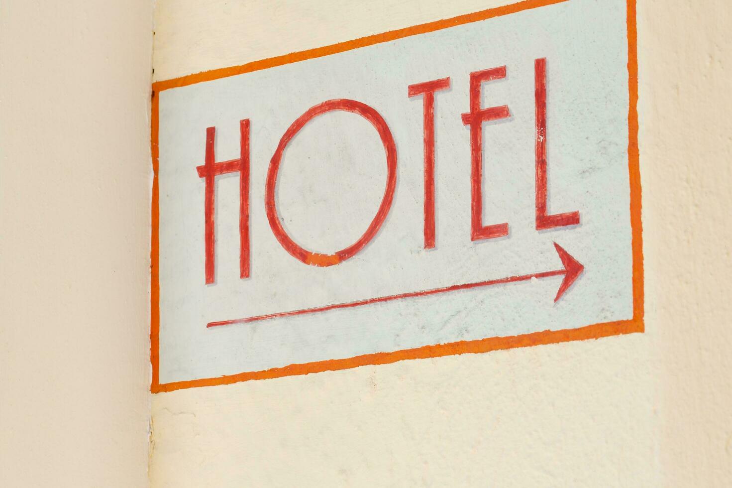 Hotel indicator at the wall in the city photo