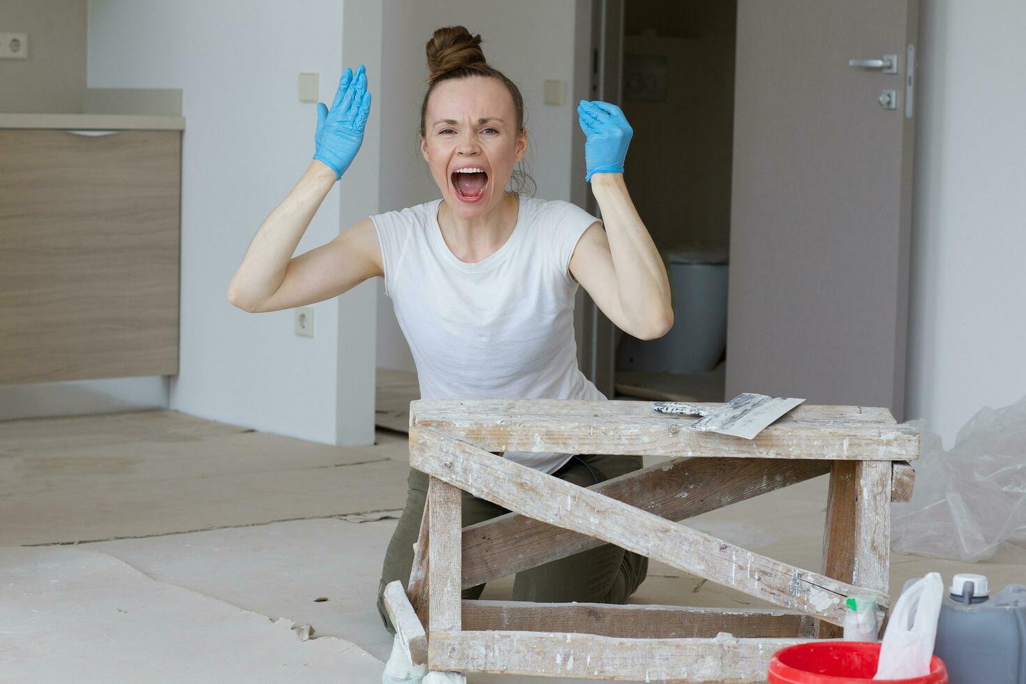 Young lady renovates  apartment photo