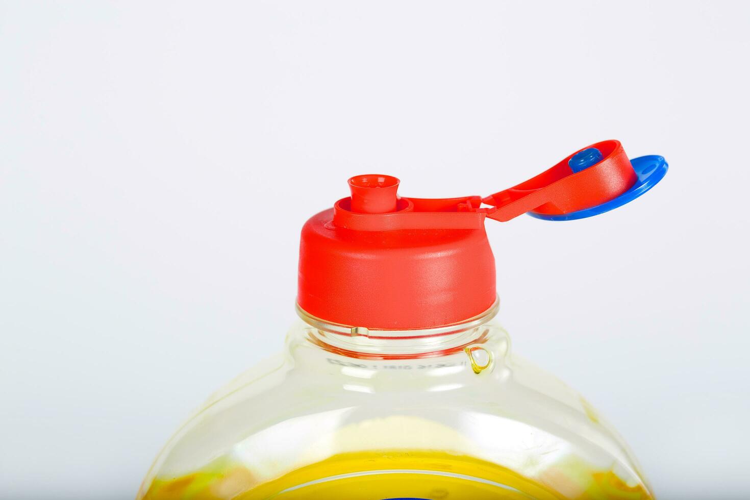 Plastic bottle with dish gel detergent. photo