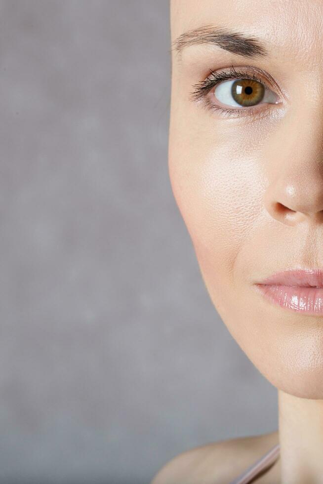 Face of young caucasian lady. Closeup photo