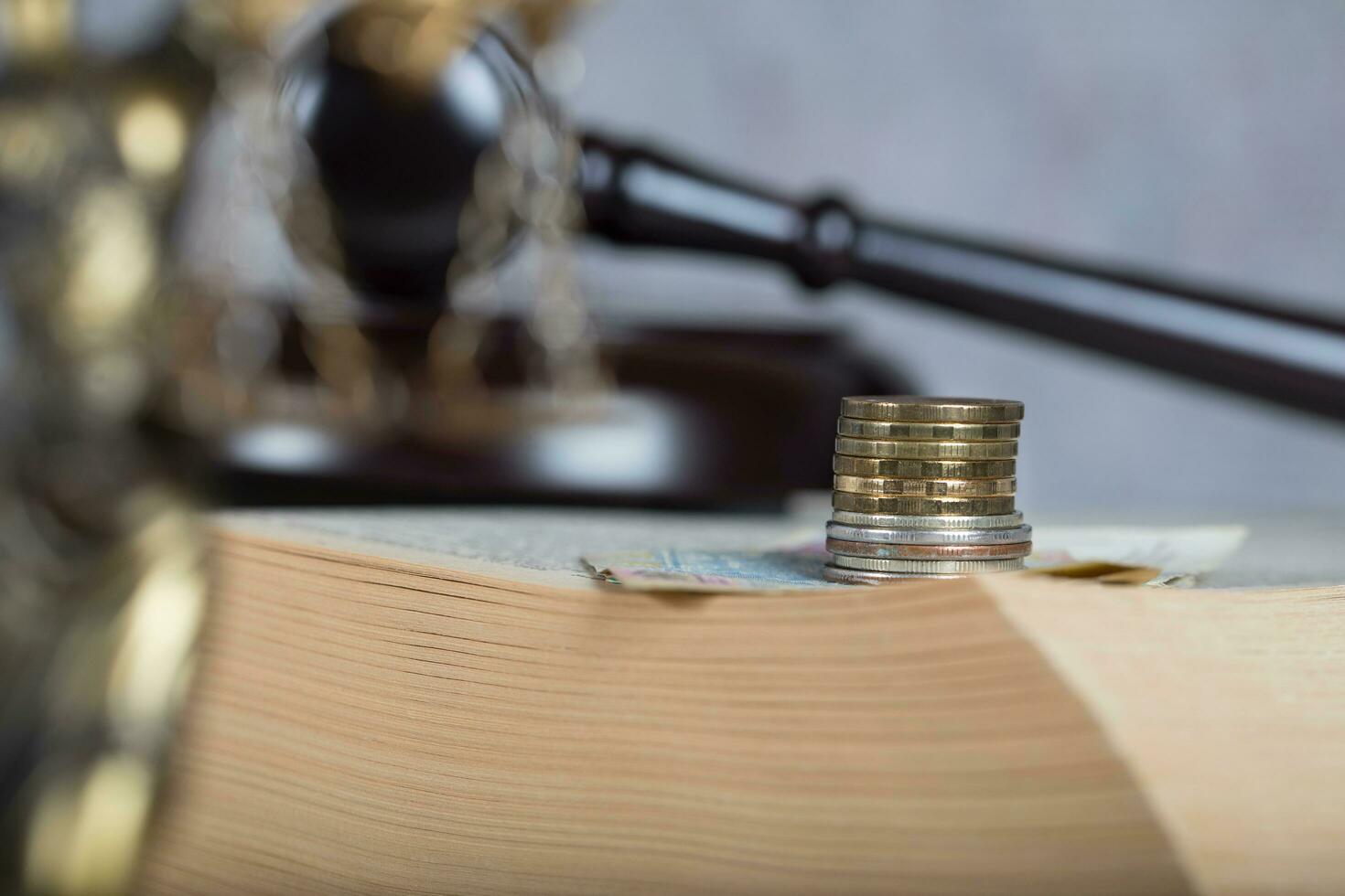 Coins on a book surface. photo