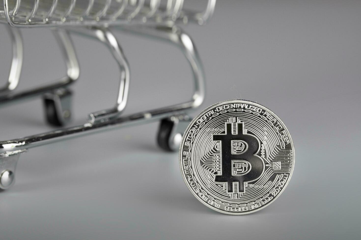 Bitcoin and shopping cart. photo