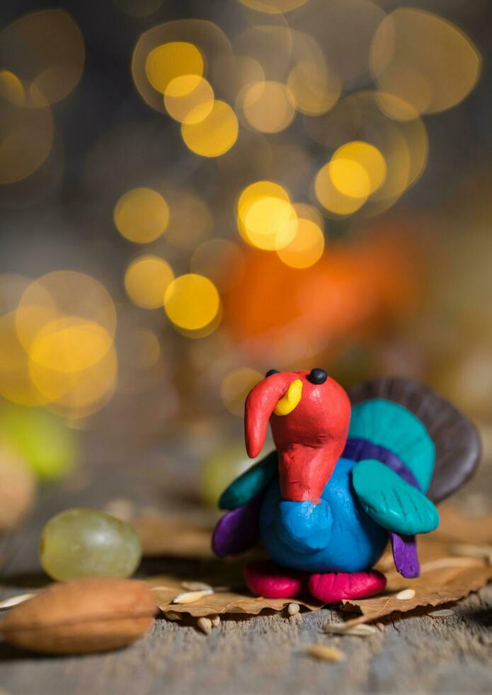 Handmade turkey on Thanksgiving background with blurred night lights. photo