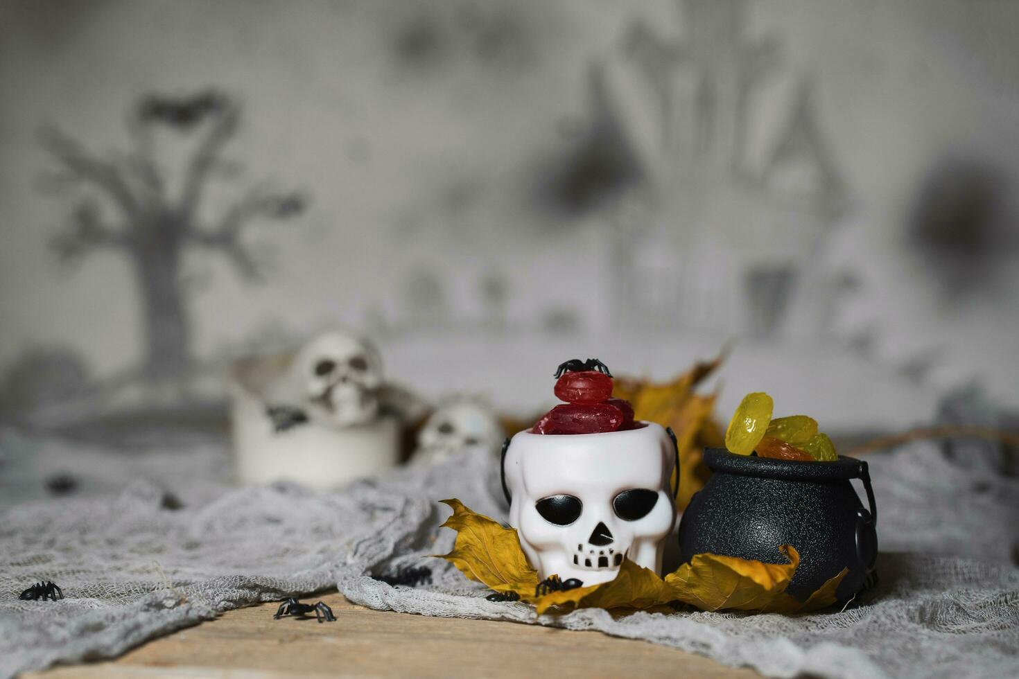 Candies in caldron for Halloween photo