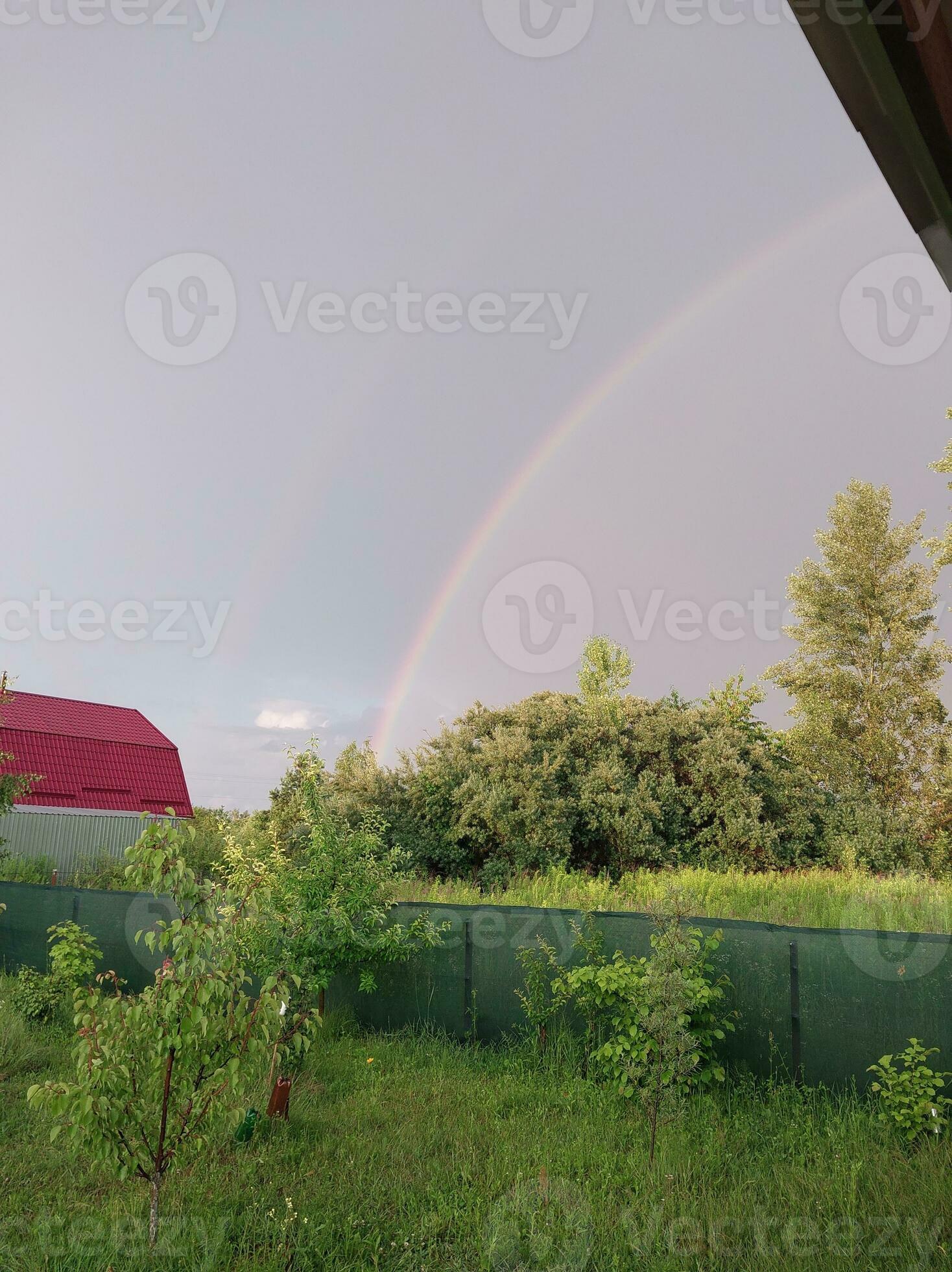 Full rainbow after rain against the sky 26308252 Stock Photo at Vecteezy