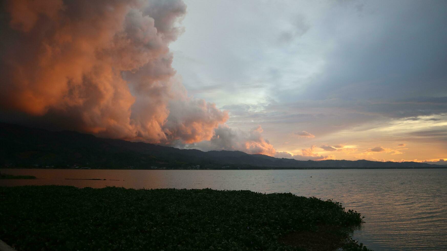 Golden clouds in the evening day with sunsets photo