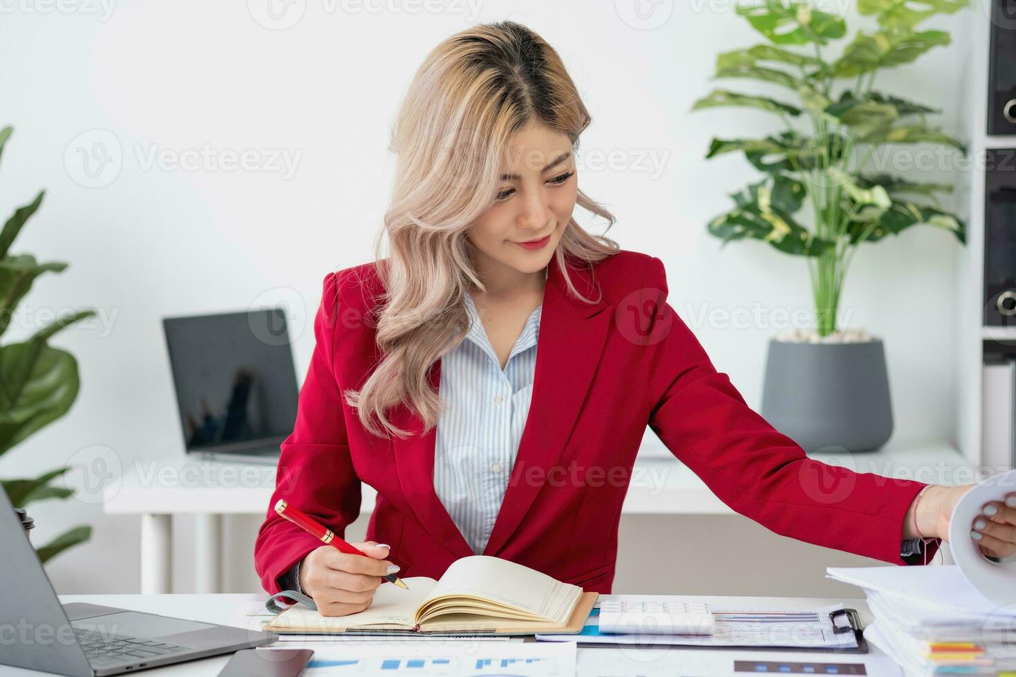 planning, auditing, business planning, finance, young asian business woman working on computer and checking investment documents and planning marketing to increase profit, business concepts photo