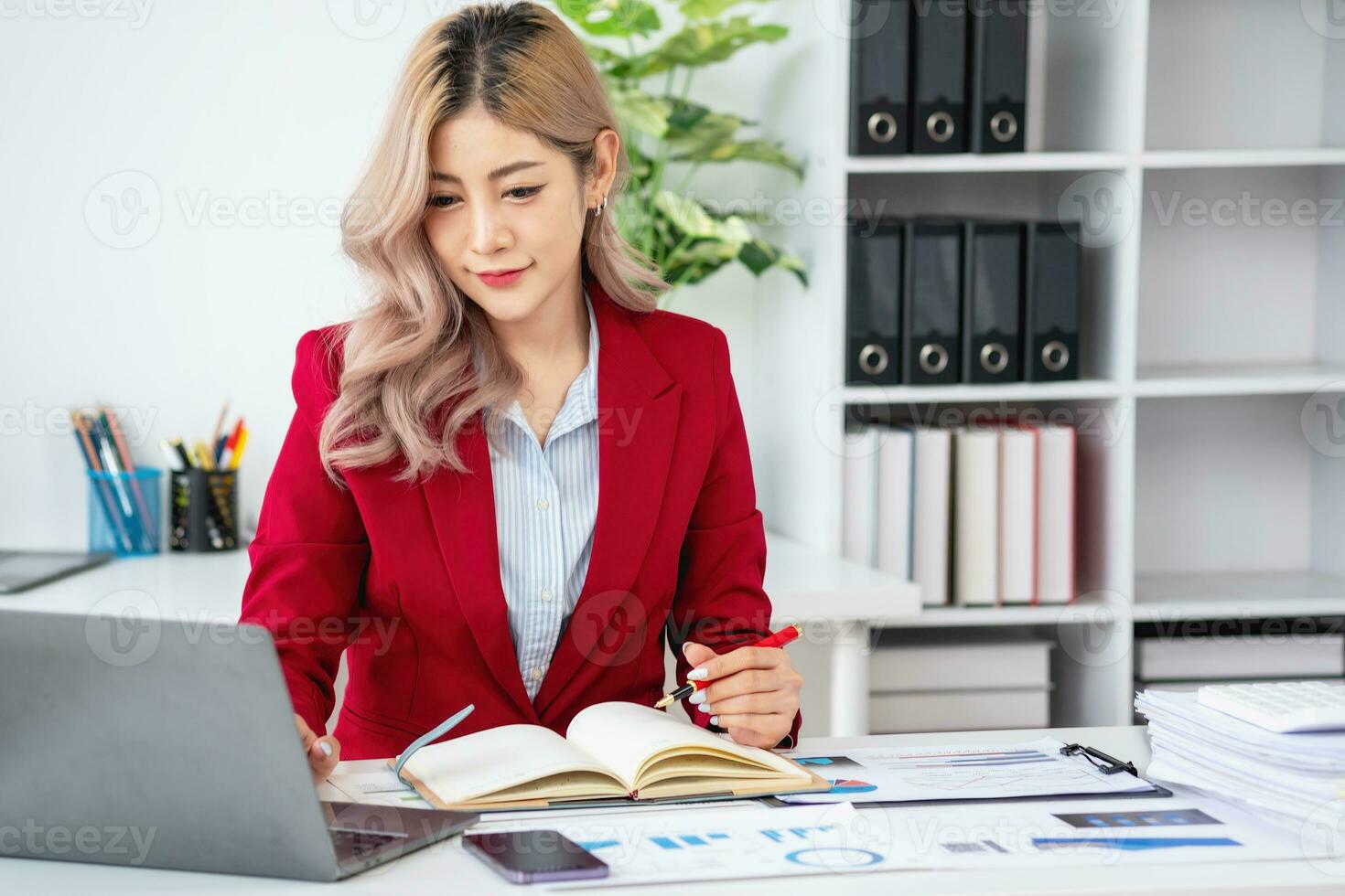 planning, auditing, business planning, finance, young asian business woman working on computer and checking investment documents and planning marketing to increase profit, business concepts photo