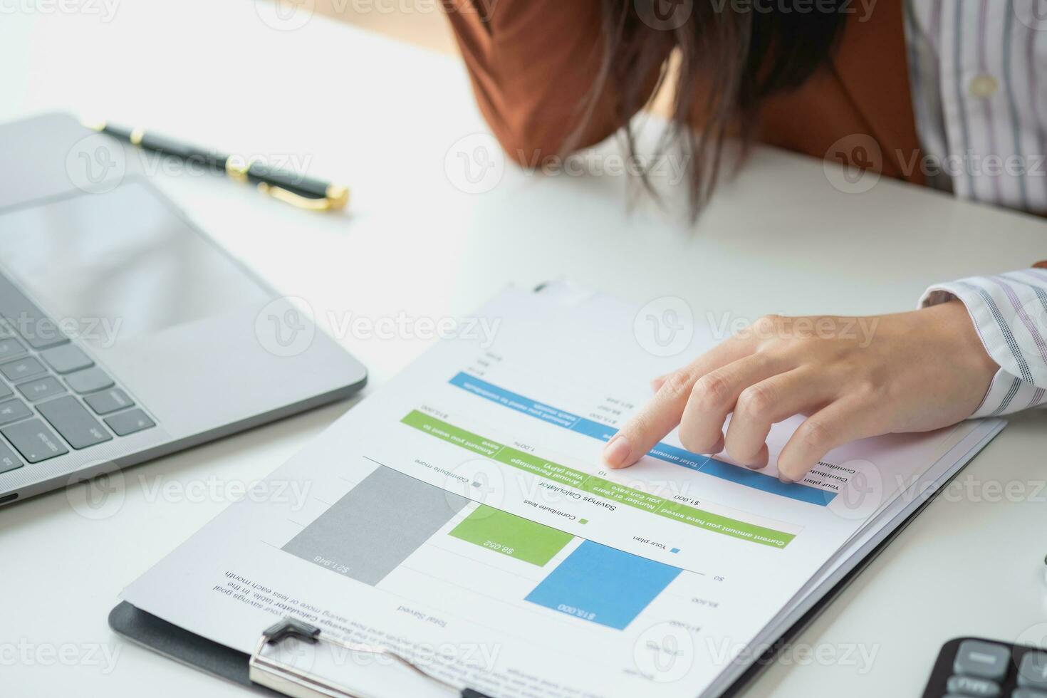 Financial advisor calculating numbers datasheets graphs charts reports marketing research development planning management strategy analysis financial accounting. Business office concept. photo