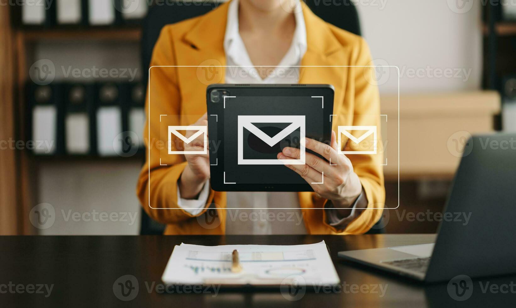 Woman hands using Laptop, tablet typing on keyboard and surfing the internet with email icon, email marketing concept, send e-mail or newsletter, online working internet network technology. photo