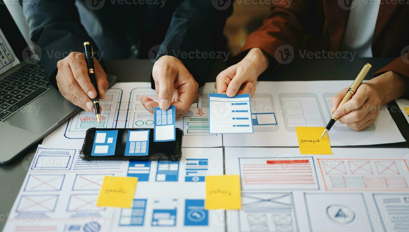 UX graphic designer planning application process development prototype wireframe for web smart phone. Creative digital development agency. photo