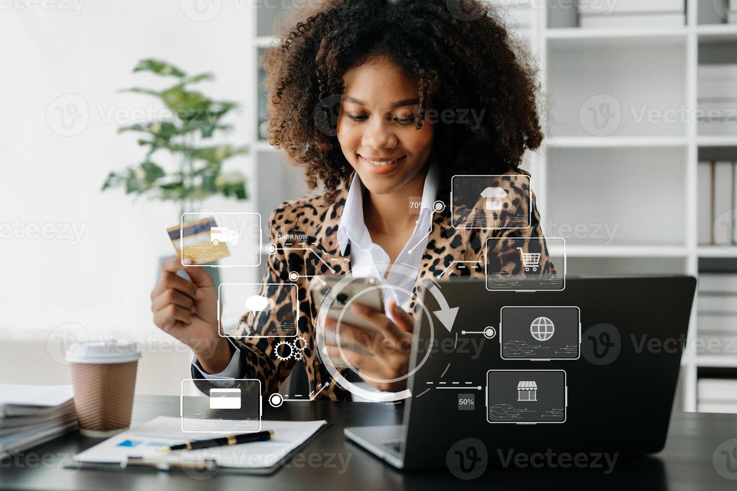 Woman Hand using tablet ,laptop, and holding mobile phone with credit card online banking payment communication network, internet wireless application virtual icon photo