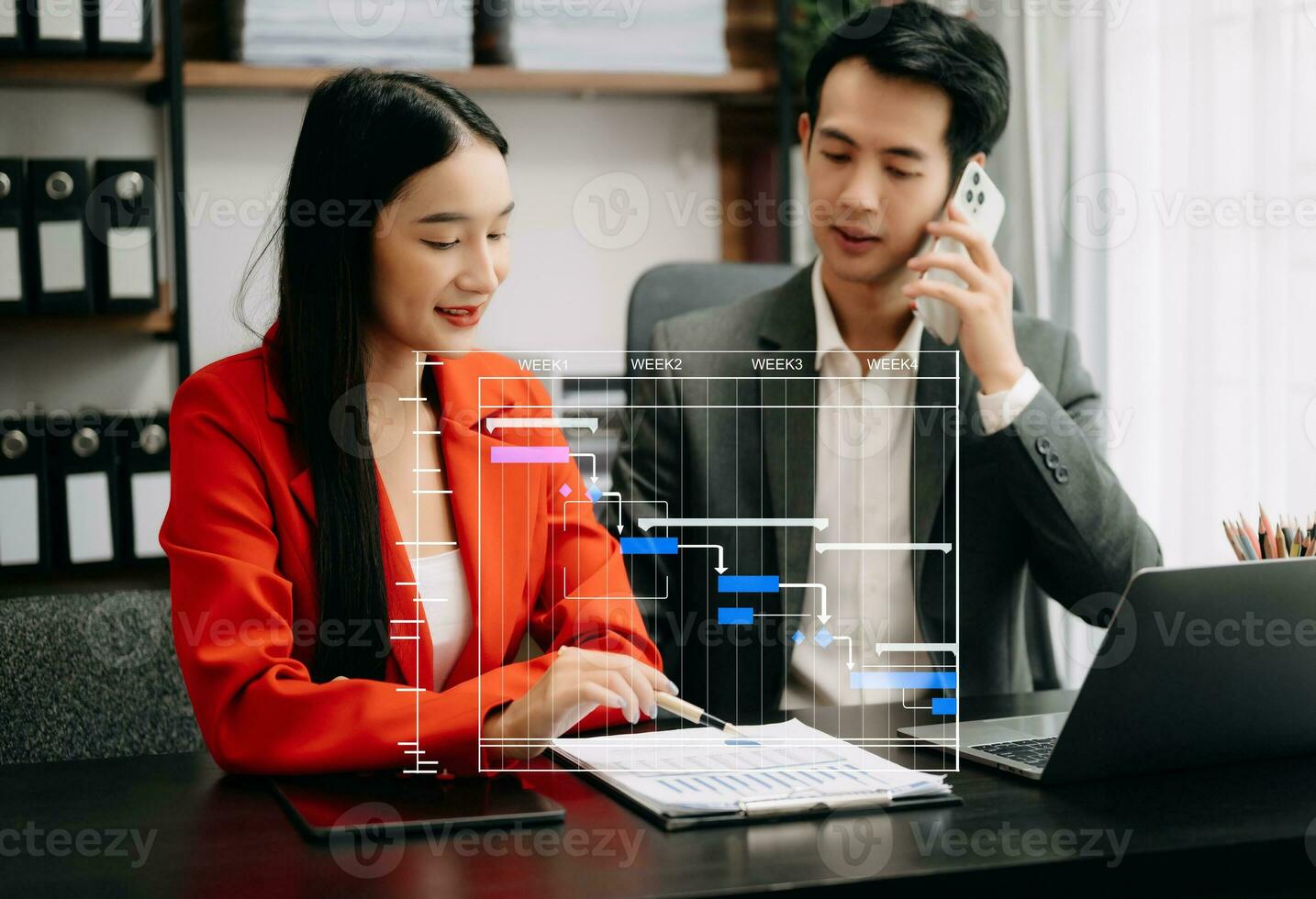 Project manager working and update tasks with milestones progress planning and Gantt chart scheduling diagram. business working with smart phone, tablet and laptop photo