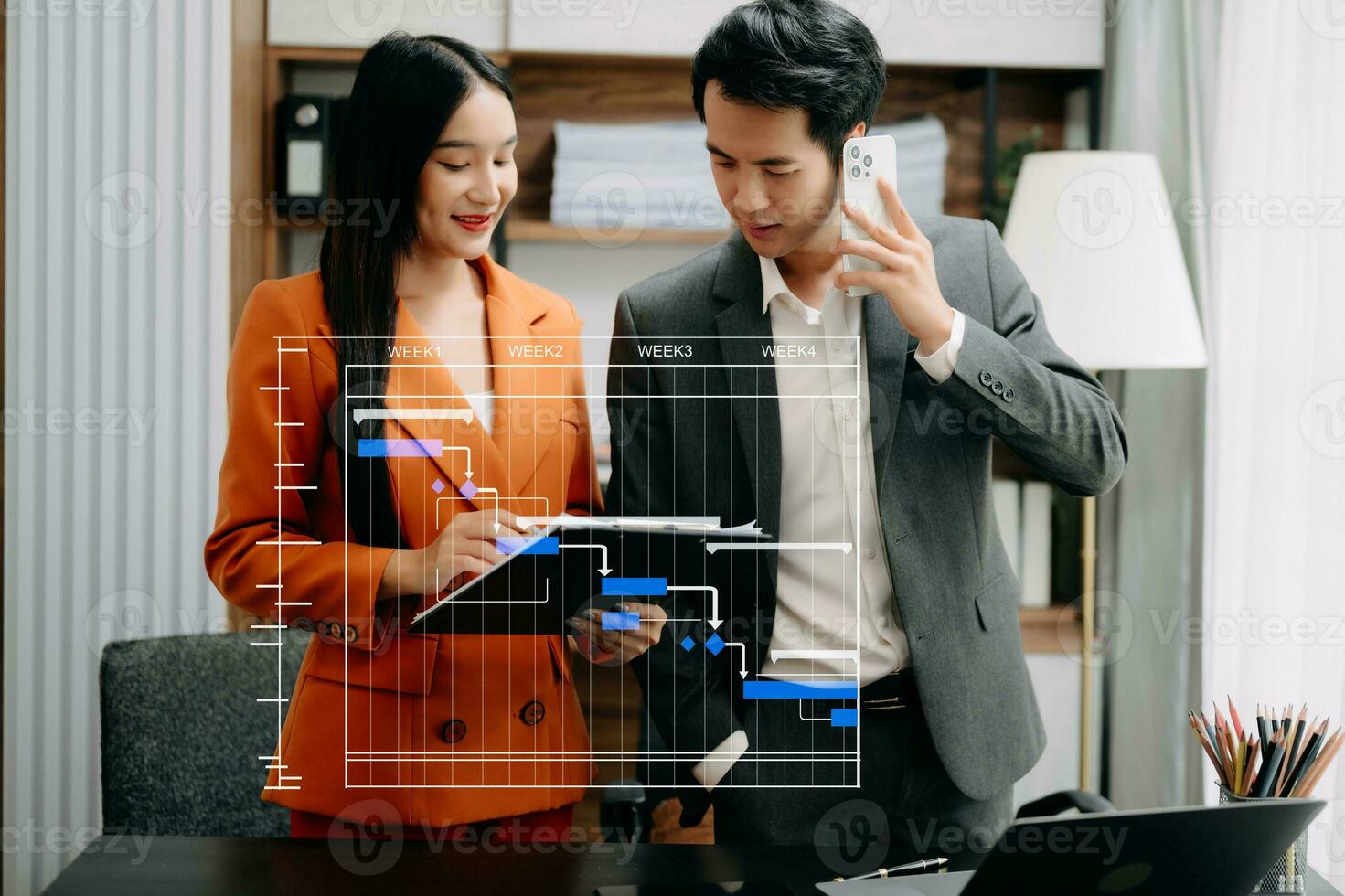 Project manager working and update tasks with milestones progress planning and Gantt chart scheduling diagram. business working with smart phone, tablet and laptop photo
