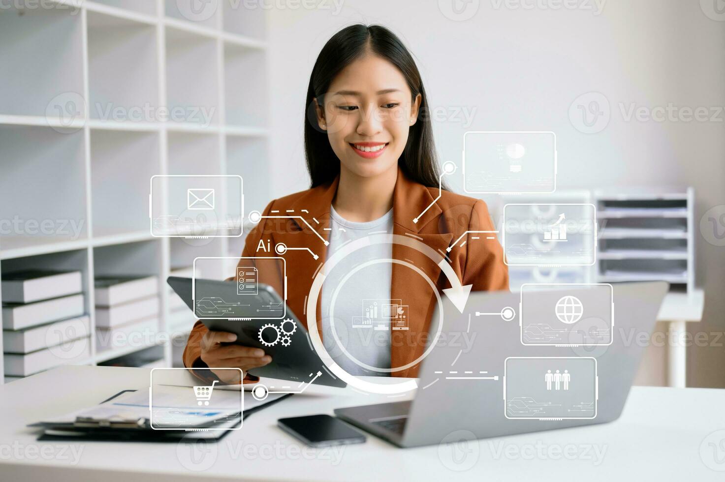 close up of businesswoman working with laptop computer and smart phone on desk in modern office with virtual icon diagram photo