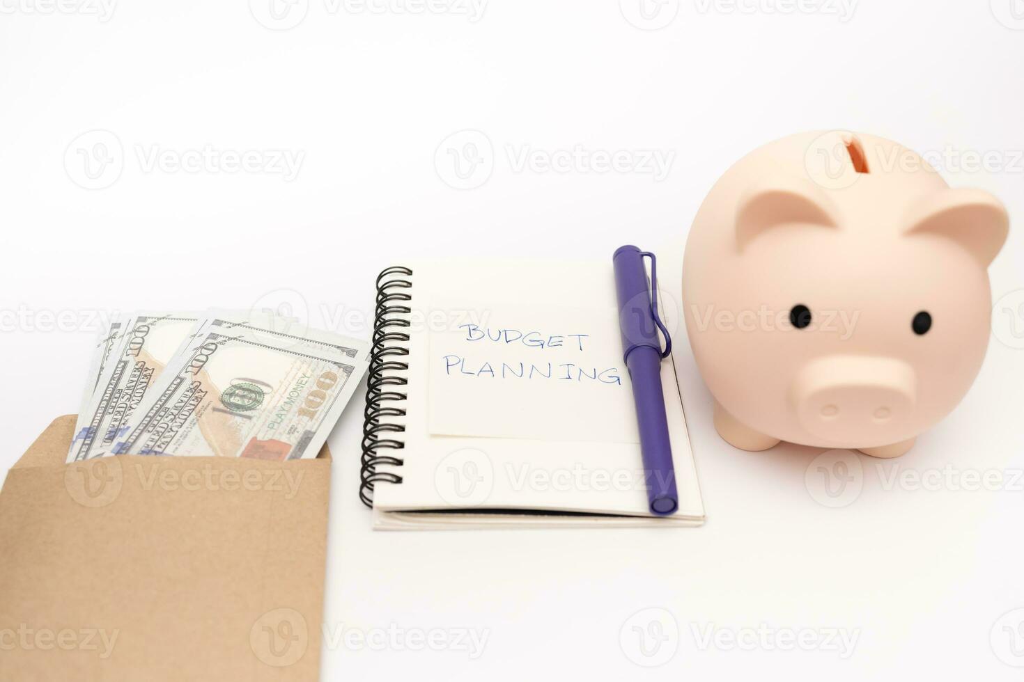 Money budget planning. Piggy bank with calculator and notebooks on white background, financial goal concept. photo