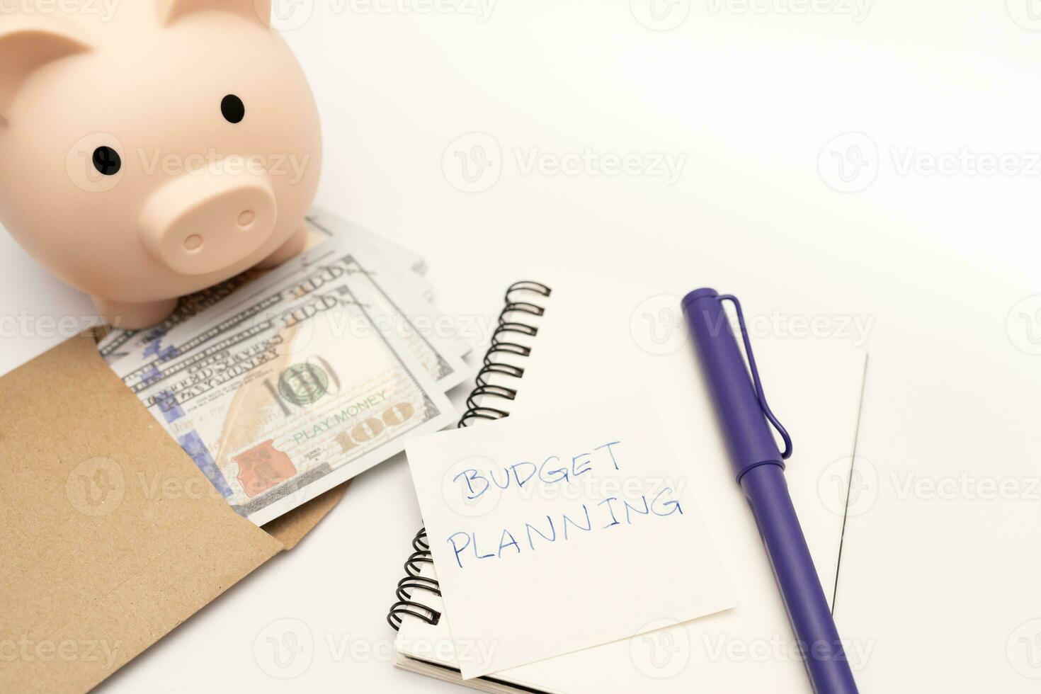 Money budget planning. Piggy bank with calculator and notebooks on white background, financial goal concept. photo