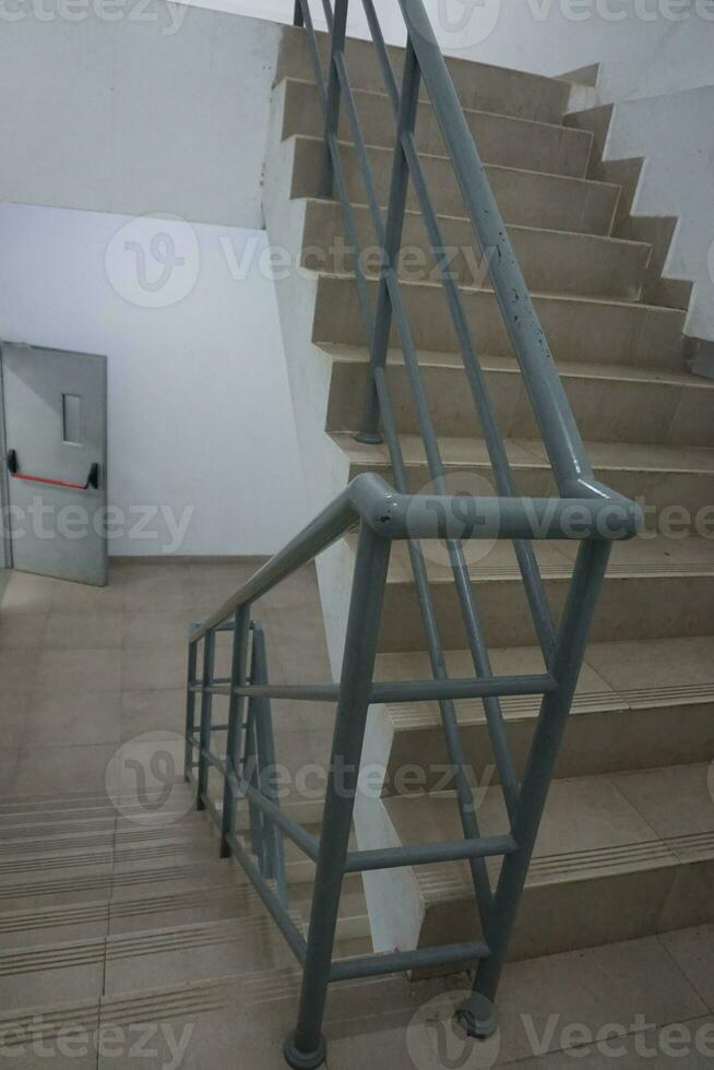 Access the building stairs for those who park under the building, go up from the bottom up or vice versa photo