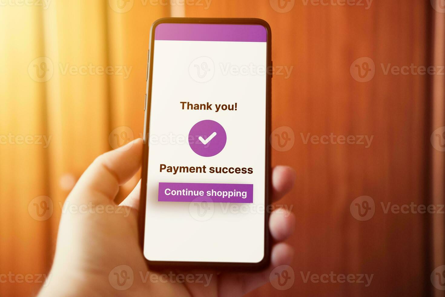 Woman use smartphone to pay online purchase. Online shopping concept. Secure payment on internet. Payment success on screen. Selective focus. photo
