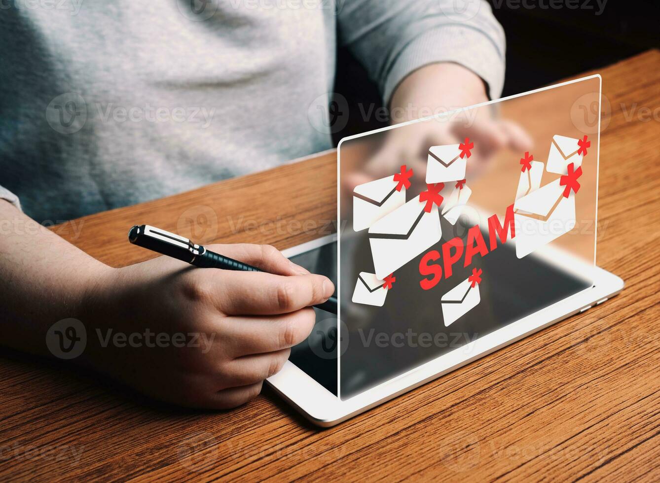 Woman use tablet with hologram mail spam concept. Communication business technology. Protect spam mail from internet cyber security. photo