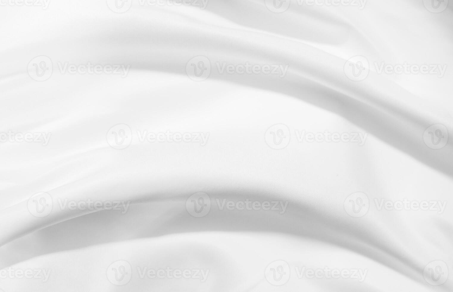 Soft focus white silk fabric texture background photo