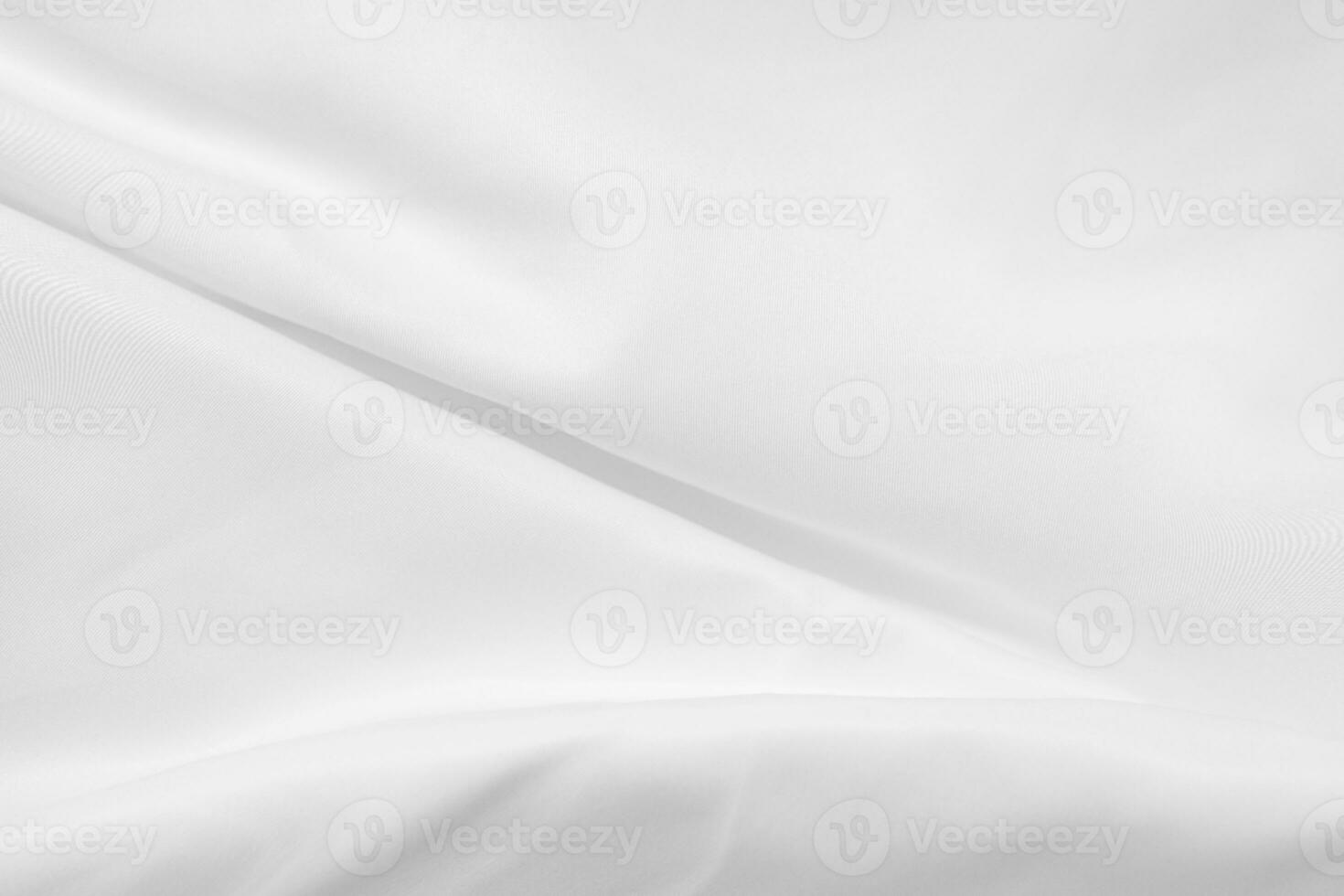 Soft focus white silk fabric texture background photo