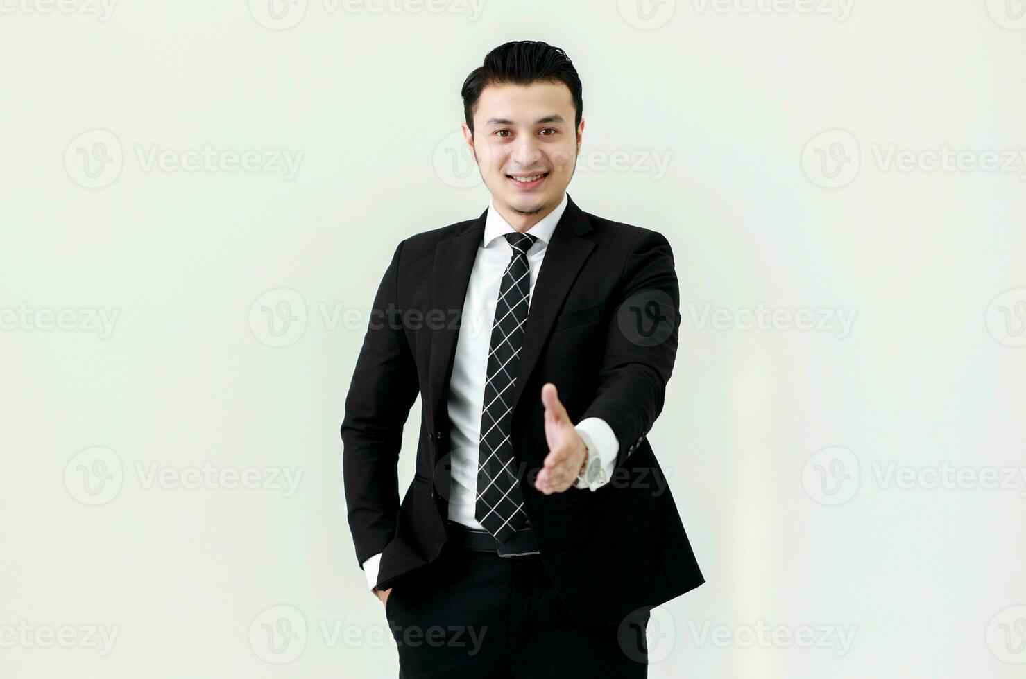 Business Asian man offering handshake ready to a deal at copy space isolated on white background, Partner shaking hands concept. photo