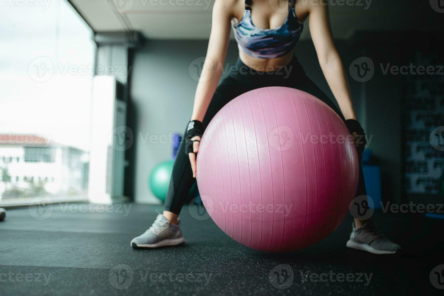 Exercise girl at gym photo