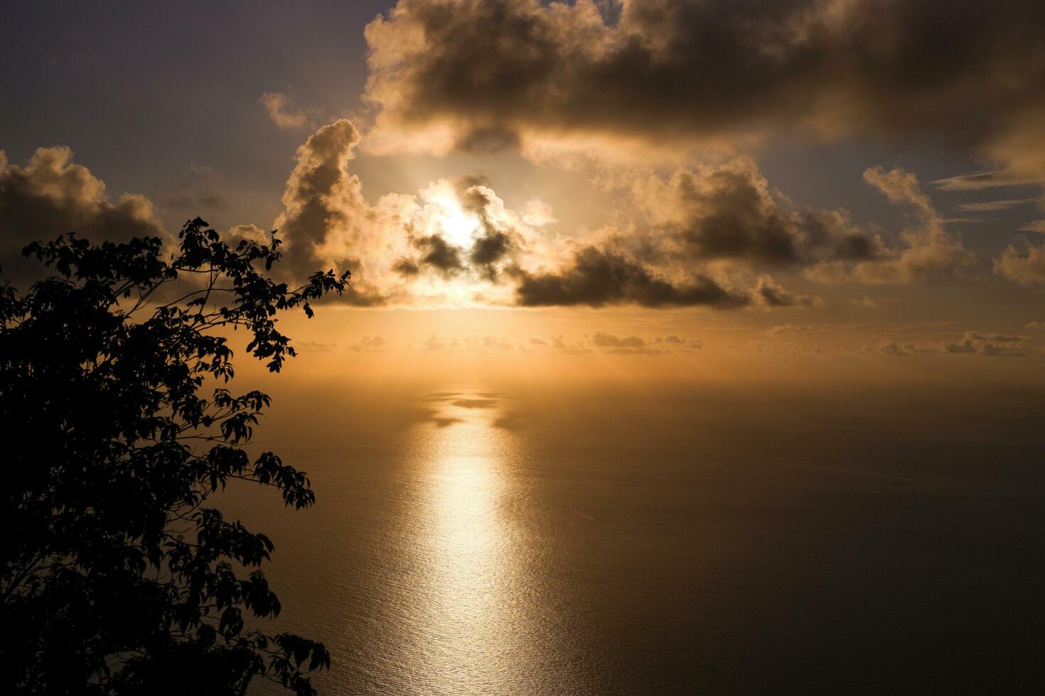 Sunset over the sea, view from the mountain photo