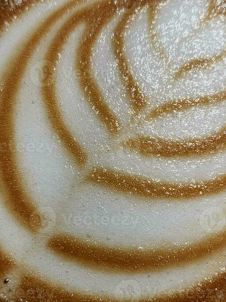 Coffee foam. Texture of coffee foam. Coffee background photo