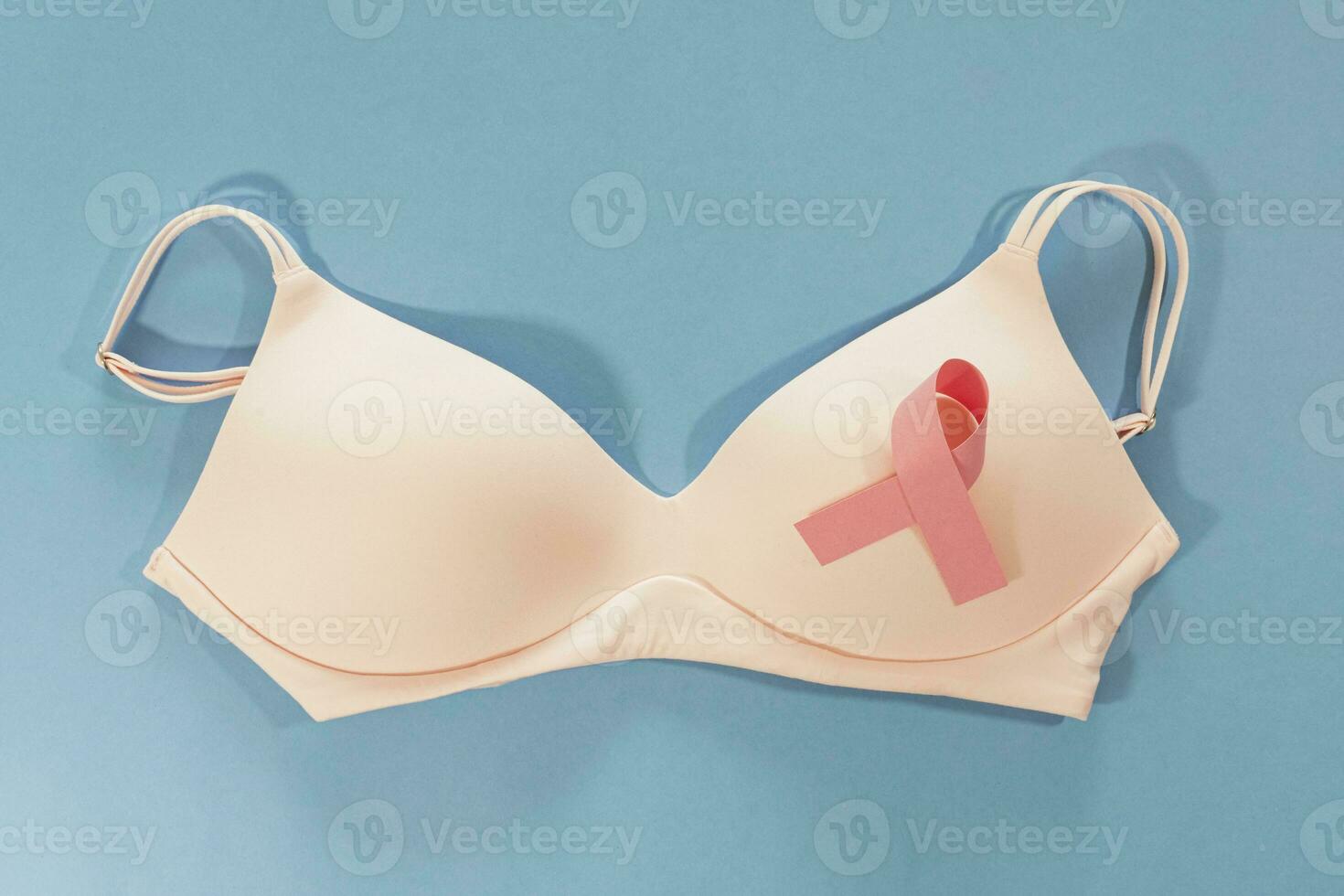 Ribbon World cancer day. pink ribbons, breast cancer symbol and bra. photo