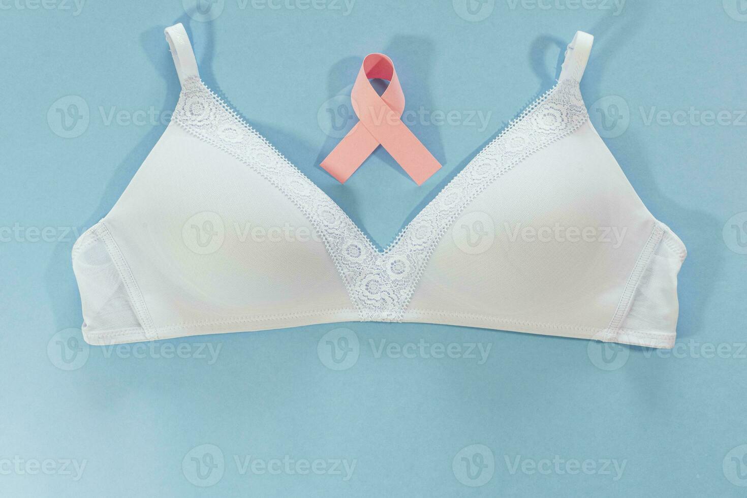 Ribbon World cancer day. pink ribbons, breast cancer symbol and bra. photo