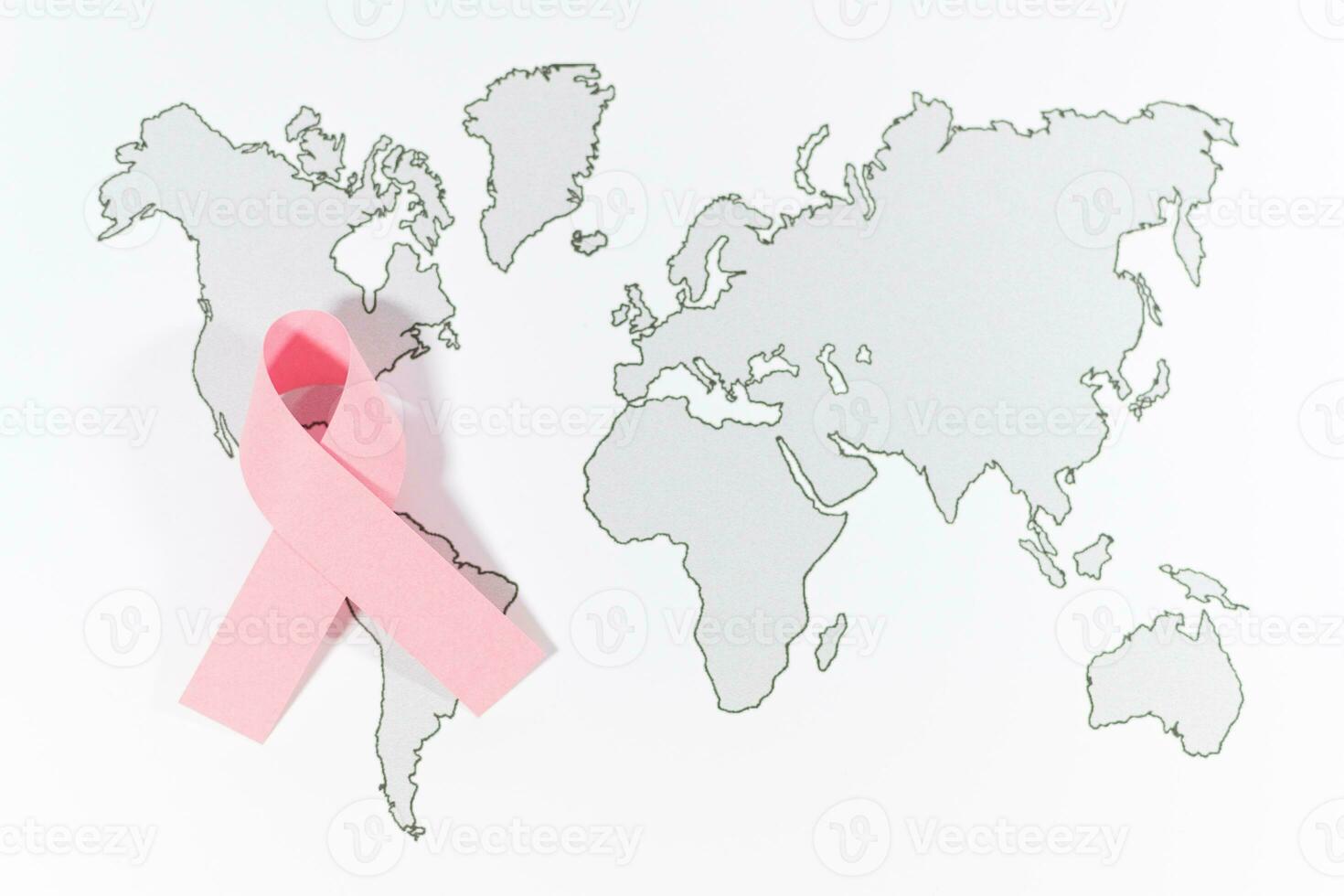 mundo cáncer día con cinta símbolo en mundo mapa antecedentes. foto