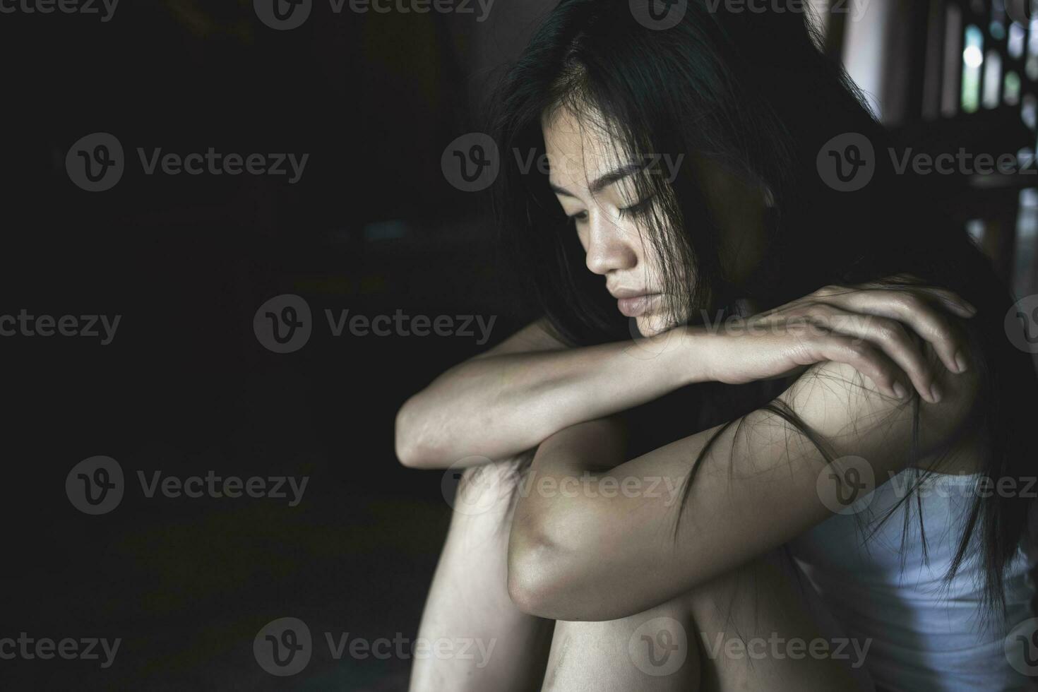 Young depressed woman, domestic violence and rape. stop abusing violence, human trafficking, stop violence against women, Human is not a product. Stop women abuse, Human rights violations. photo