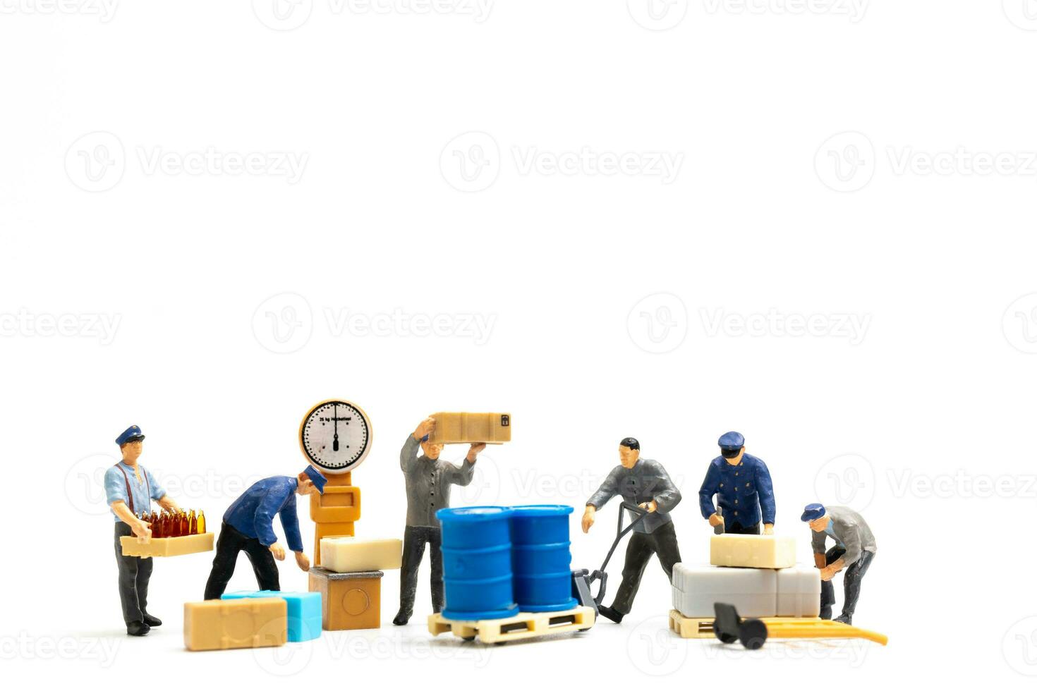 Miniature people , Worker team standing on white background, Labour day concept photo